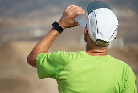 Man Drinking Water Outdoors