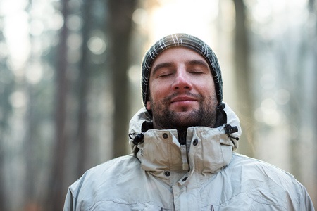 Man Outside in the Woods Smiling