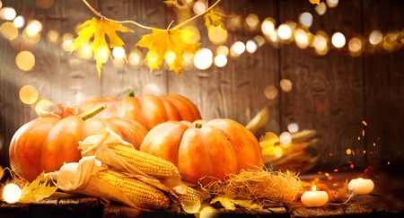 Display of Pumpkins on Wooden Base