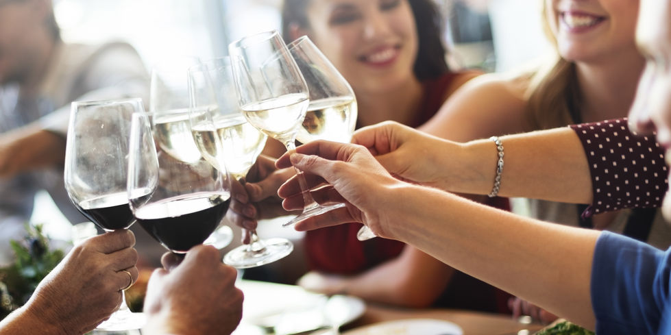 Group celebrating with glasses of wine